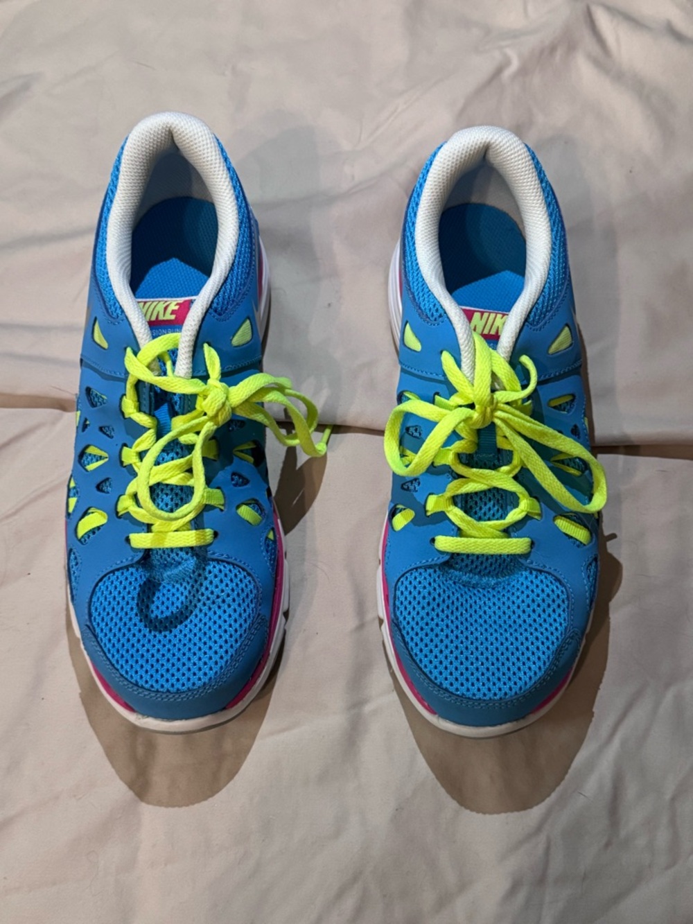 Nike Bright Blue Sneakers with Neon Yellow Laces and Pink Accents
